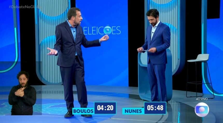 Guilherme Boulos e Ricardo Nunes no debate da TV Globo — Foto: Rreprodução/TV Globo